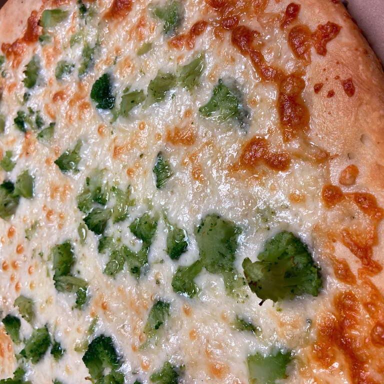 Indulge in Our White Pizza